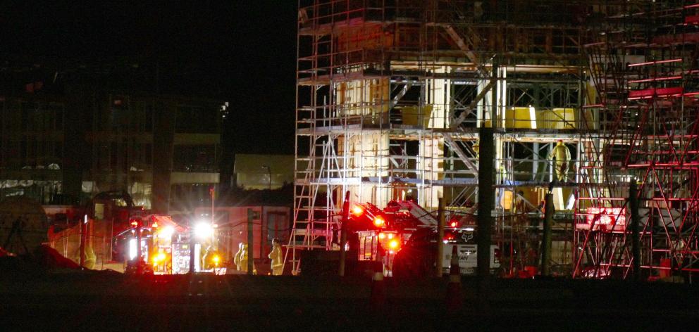 Firefighters and police attend a fire at a construction site in Frankton’s Hawthorne Dr on...