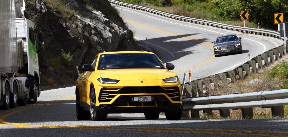 Motoring reporter Catherine Pattison takes a ride in a Lamborghini Urus. Photo: Stephen Jaquiery 