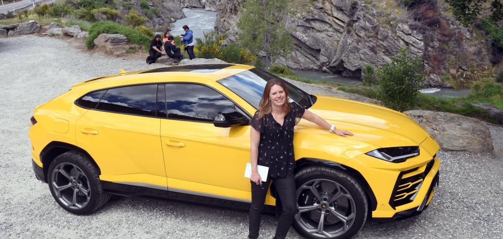 Motoring reporter Catherine Pattison takes a ride in a Lamborghini Urus. Photo: Stephen Jaquiery