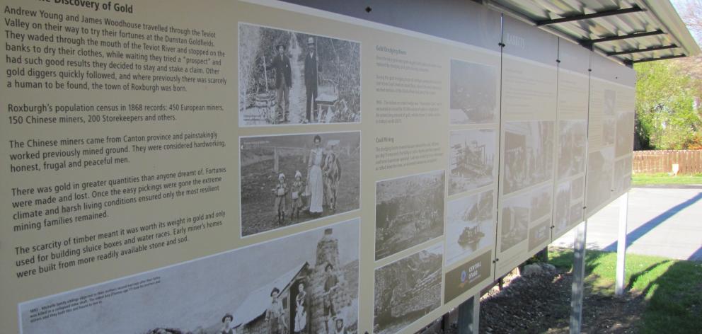 Information panels tell of the gold-mining and orcharding history of the Teviot Valley.
