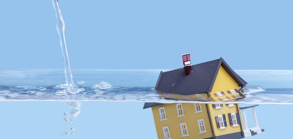 As house prices continue to fall, banks are more reluctant to lend. Photo: Getty Images
