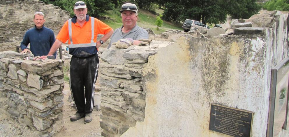 Heritage stonemasons (from left) Paul Myall and Murray Reeves, both of Clyde, and Keith Hinds, of...