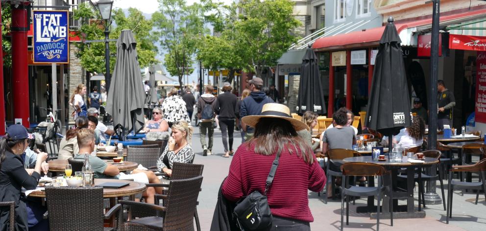 Diners enjoy the atmosphere in Mall St in Queenstown yesterday. Photo: Joshua Walton
