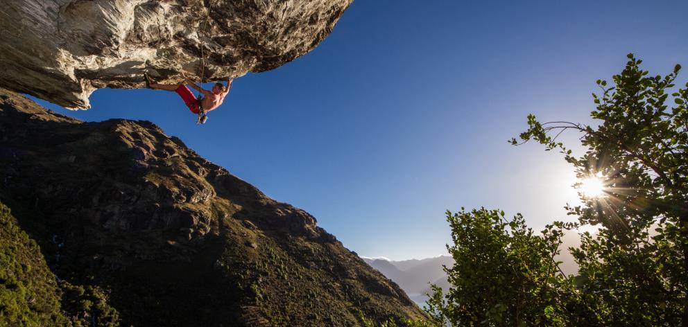 Michal Karnik climbs one of  Queenstown’s hardest routes at Wye Creek on Eweniverse. Photo: Guillaume Charton