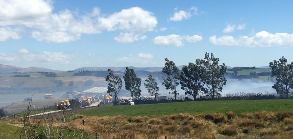 Smoke blankets the scene after a fire broke out at a Clutha farm today. Photo: Richard Davison Smoke blankets the scene after a fire broke out at a Clutha farm today. Photo: Richard Davison