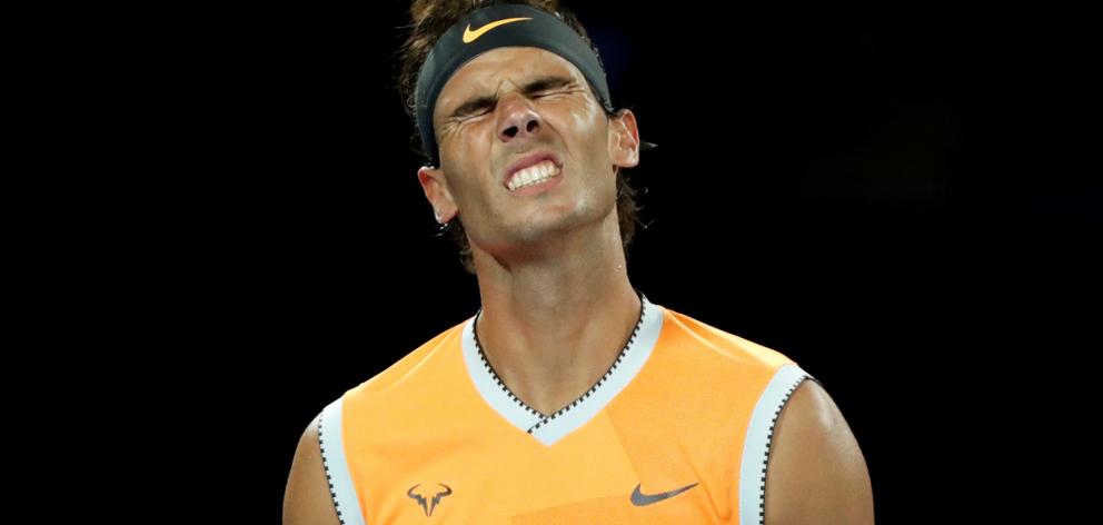Blitzed from the start, Nadal could only congratulate an opponent that condemned him to his worst Grand Slam defeat in their long rivalry. Photo: Reuters