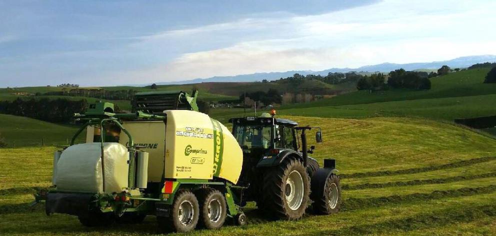 Baleage being made on a North Otago farm. PHOTO: NORTH OTAGO DITCHING & BALING








