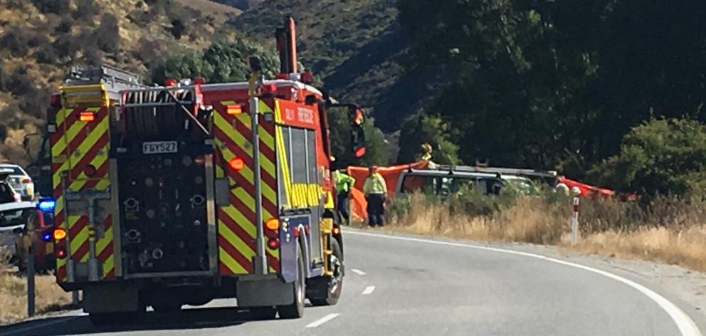 Emergency services at the scene of a serious crash between a car and motorcycle near Cardrona. Photo: Mark Price