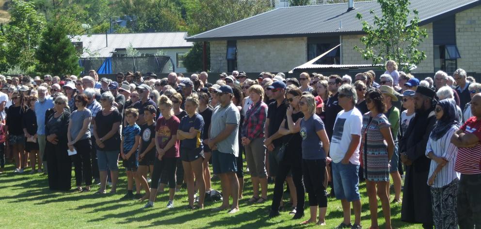 Central Otago residents gather together in Clyde yesterday to show solidarity after Friday's...