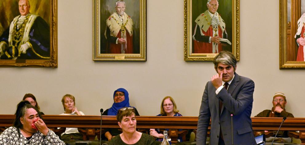 An emotional Dunedin city councillor Aaron Hawkins (right) urges the community to tackle racism in all its forms, flanked by (from left) Cr Marie Laufiso and Cr Rachel Elder, at yesterday's Dunedin City Council meeting. Photo: Christine O'Connor