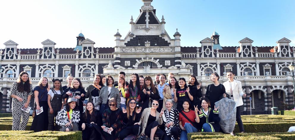 A group of emerging designers gather for their designs to be photographed at the Dunedin Railway Station. Photo: Peter McIntosh