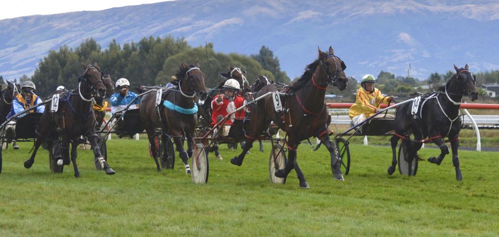 Franco June and driver Mark Hurrell fight off the challengers to win at Wingatui yesterday. PHOTO...