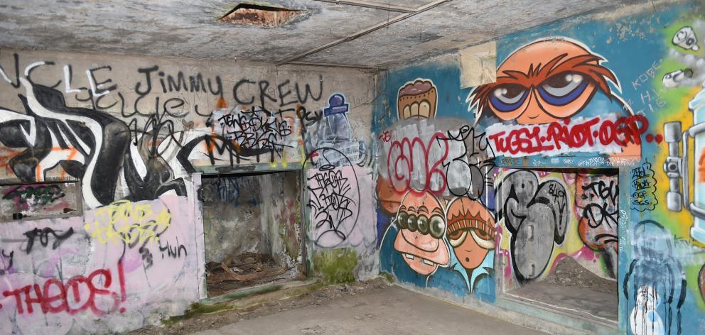Graffiti scars this military complex at Harington Point, built to support nearby gun emplacements...