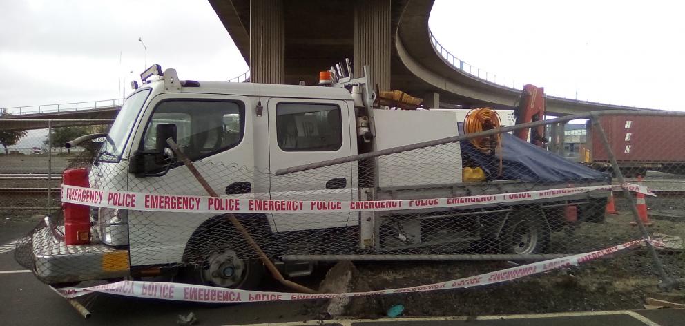 The stolen Kiwirail truck that was crashed under the Jetty St overbridge yesterday. Photo: Peter Dowden