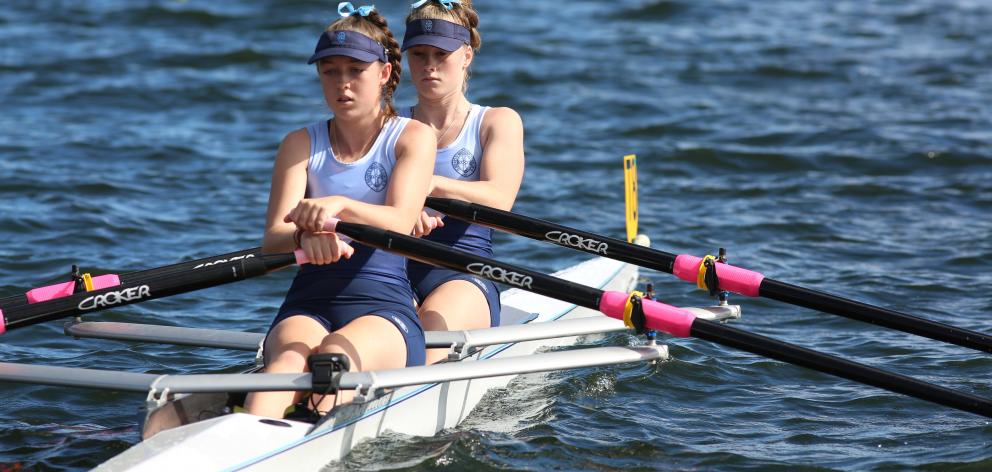St Hilda's Collegiate duo Millie Davenport (front) and Sophie Smith compete in the under-16 girls double sculls at the Maadi Cup at Lake Karapiro. Photo: Sharron Bennett