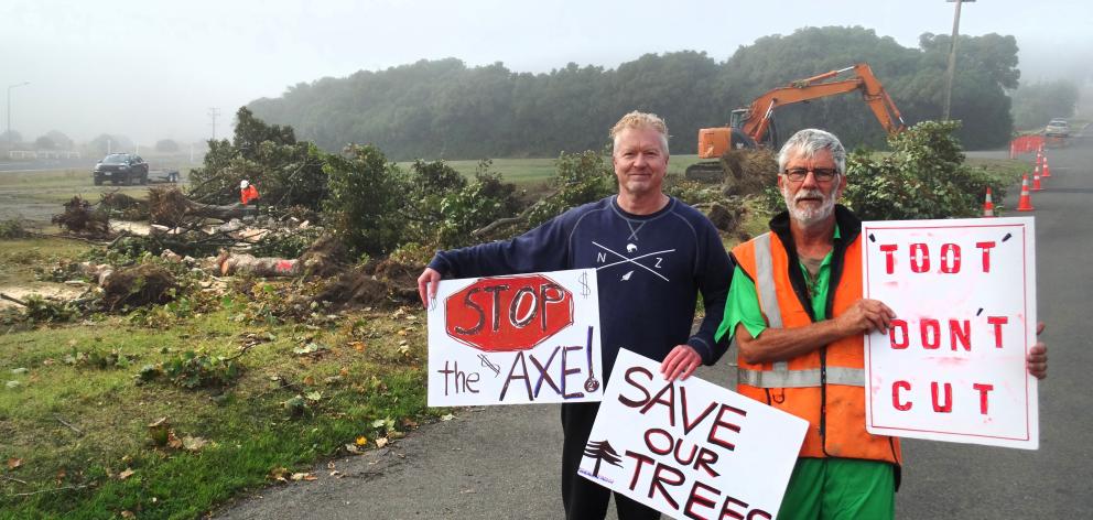 Tyne St residents Ian Bradshaw (left) and Brian Harris protest the removal of nine sycamore trees...