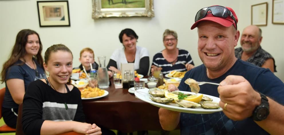 Ian Manson, of Eketahuna, prepares to enjoy the first oysters of the season at Dunedin's Best...