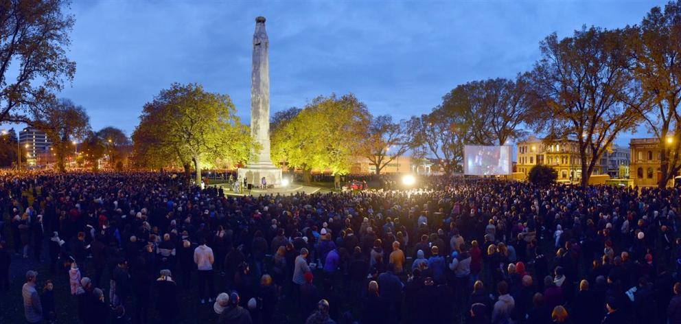 The first rays of sunshine appear over the Cenotaph in Dunedin during the dawn service yesterday....