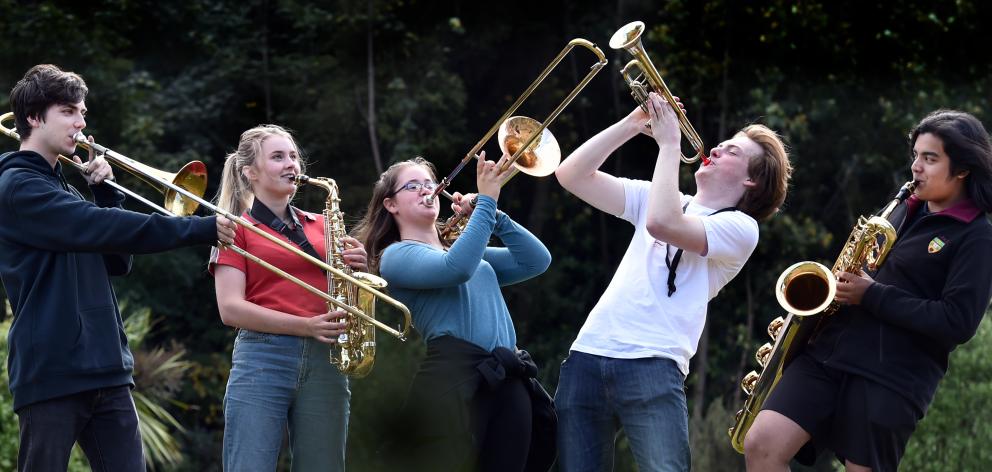 Logan Park High School Big Bad Big Band members (from left) Colin MacAndrew (17), Lealia Devereux (17), Anna Denys (17), Hamish O'Malley (17) and Jayden Jesudhass (14) are headed to the Mt Gambier Jazz Festival in South Australia. Photo: Peter McIntosh