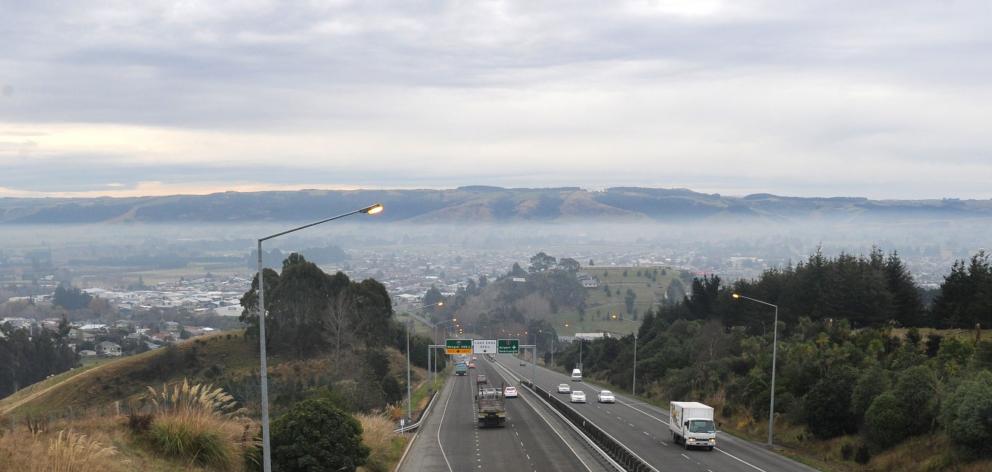 A cold windless winter day on the Taieri results in a layer of smog. Photo: Christine O'Connor 