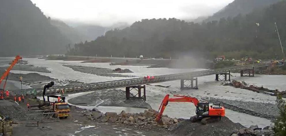 Work continues on the Bailey bridge across the Waiho River yesterday.PHOTO: NZTA

