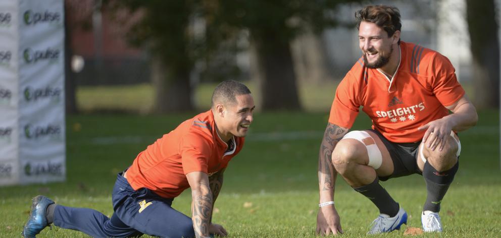 Elliot Dixon with halfback Aaron Smith at training earlier this week.  PHOTO: GERARD O’BRIEN