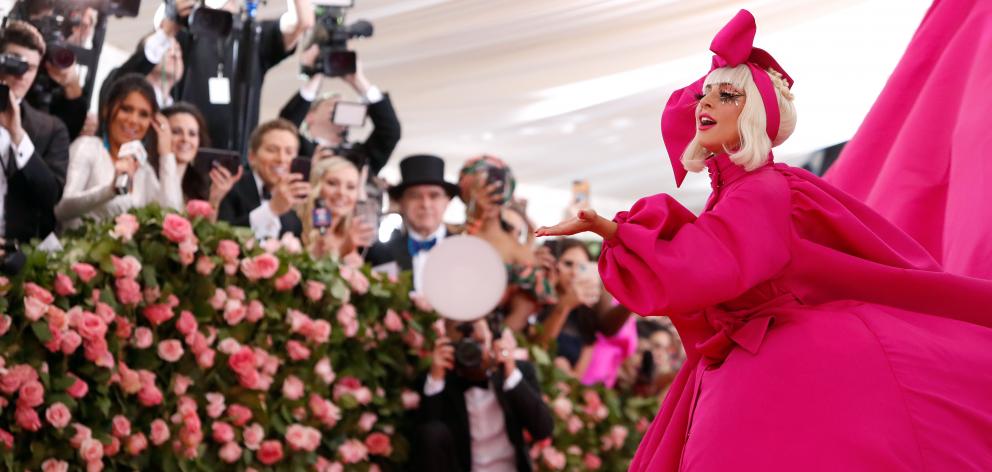 Pop superstar Lady Gaga made a grand entrance at New York's annual Met Gala on Monday, wearing a voluminous bright pink dress. Photo: Reuters