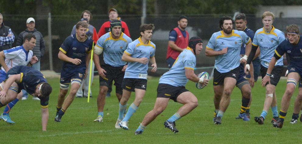 Action from today's premier match between University and Dunedin at Logan Park. Photo: Gerard O...