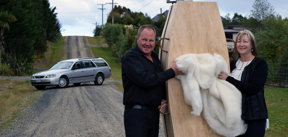 Exit Funeral Services co-owners Gary and Diane Shaw display a perendale wool lining destined for a casket. Photo: Shawn McAvinue Exit Funeral Services co-owners Gary and Diane Shaw display a perendale wool lining destined for a casket. Photo: Shawn McAvinue