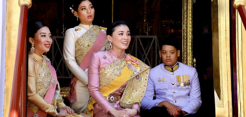 Thailand's Queen Suthida surrounded by Princess Bajrakitiyabha, Princesses Sirivannavari Nariratana and Prince Dipangkorn. Photo: Committee on Public Relations of the Coronation of King Rama X/Handout via Reuters
