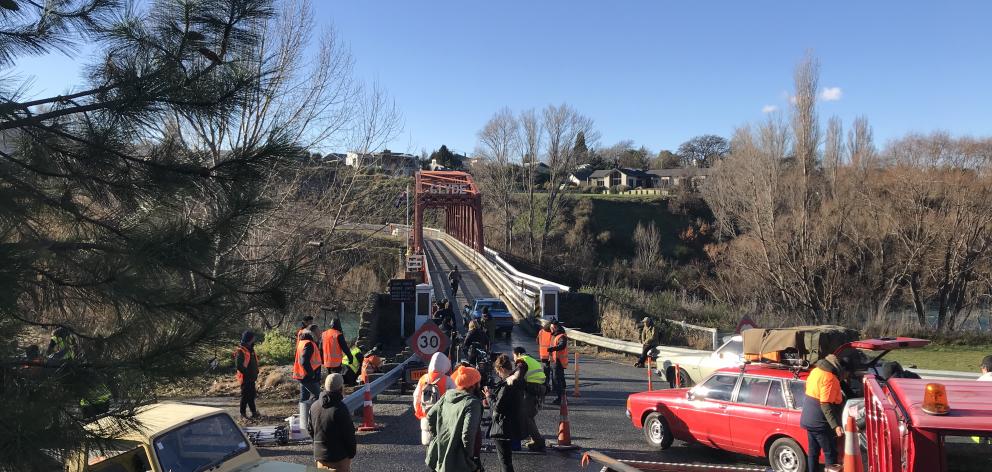 Film crews prepare for the next scene yesterday across the Clyde Bridge. PHOTO: MATT NOONAN