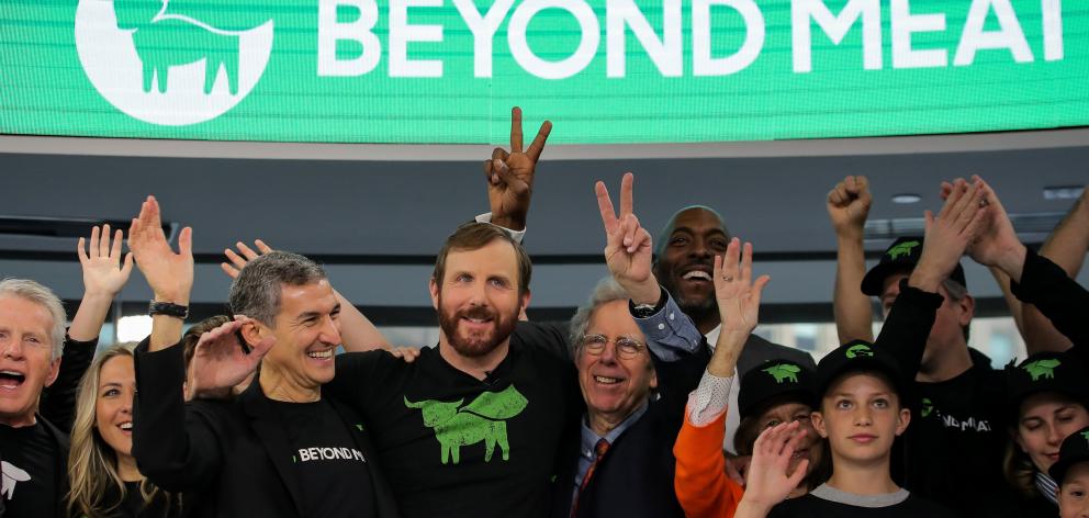 Ethan Brown, founder and chief executive of beyond Meat. and guests. ring the opening bell to...