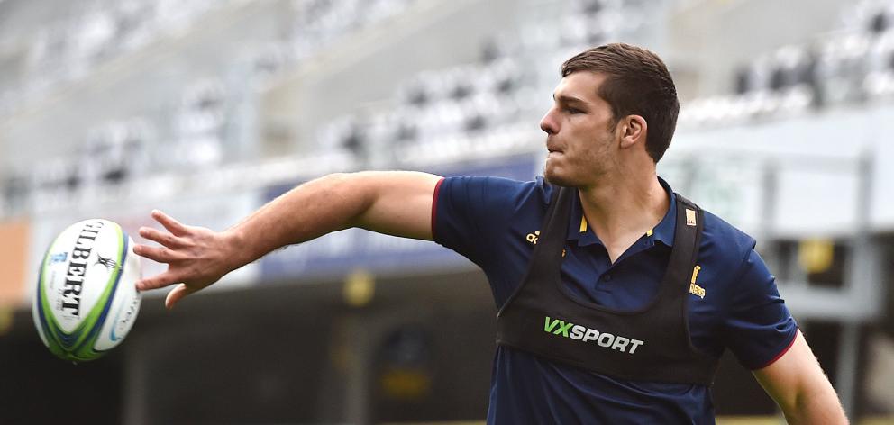 Highlanders flanker Dillon Hunt passes the ball at training at Forsyth Barr Stadium earlier this...