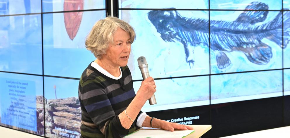 Joan Anderson reading her poem, Foulden Maar, at the opening yesterday of the "Fossils of Foulden...