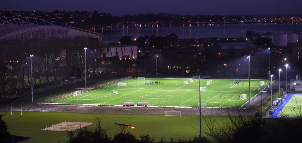 The new artificial turf facilities at Logan Park sparkle under lights earlier this month. PHOTO:...