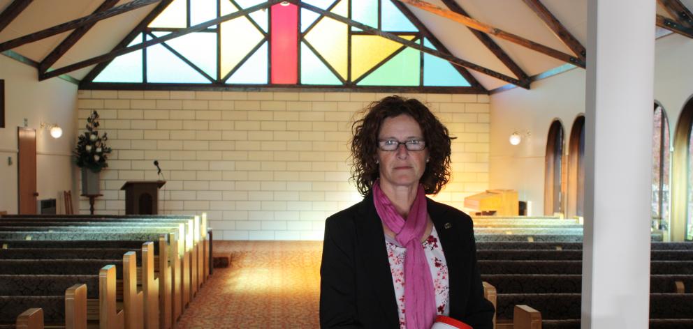 Whitestone Funerals manager Janeen Paull holds ``forgotten Mary'', who will be laid to rest next month. Photo: Gus Patterson