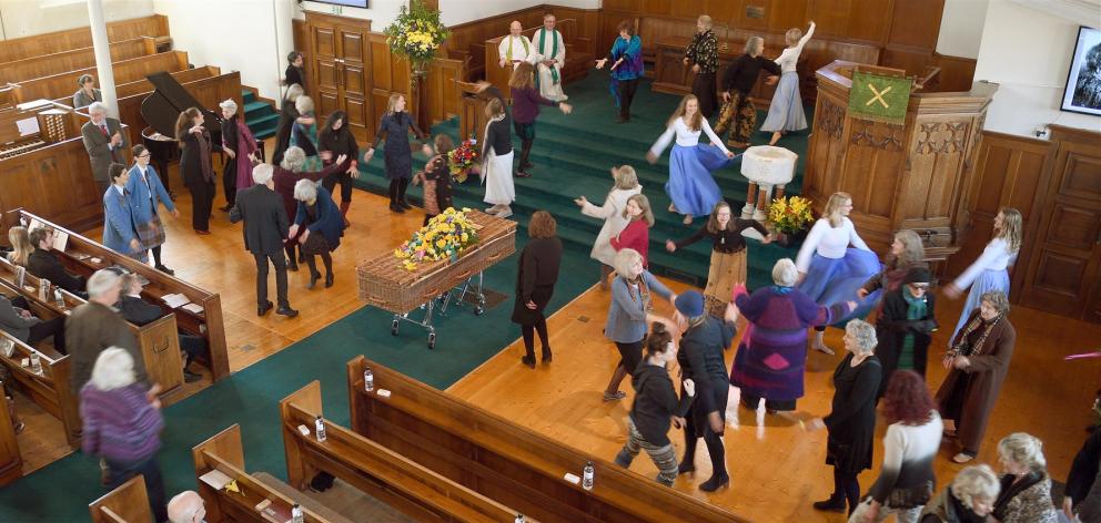 People express their love of movement at Shona MacTavish’s funeral at Knox Church yesterday. Photo: Stephen Jaquiery