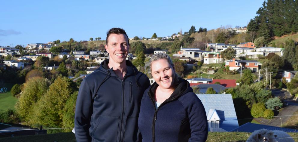 Shaun and Jess Brown, of Dunedin, are searching for a rental property to buy and joining the scores of people attending open homes. Photo: Shawn McAvinue