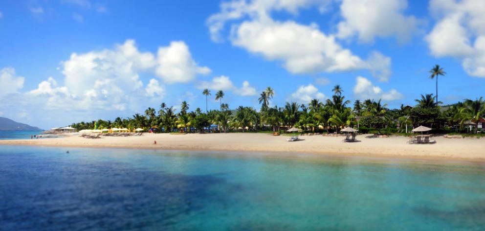 Pinney’s Beach, the largest on Nevis, runs past the recently refurbished Four Seasons Resort....