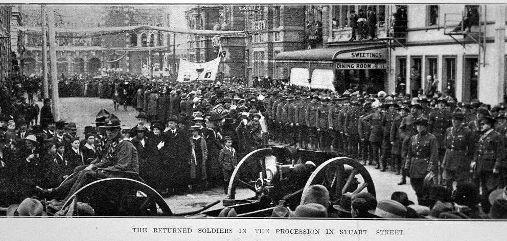 The returned soldiers in the procession in Stuart St. Photo: Otago Witness The returned soldiers in the procession in Stuart St. Photo: Otago Witness