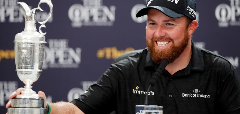 Republic of Ireland's Shane Lowry with the Claret Jug trophy in a press conference after winning The Open Championship. Photo: Reuters