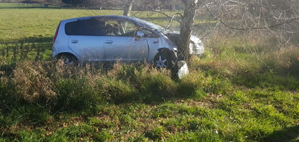 A car came off the road and hit a tree in Mosgiel today. Photo: Maddy Horn A car came off the road and hit a tree in Mosgiel today. Photo: Maddy Horn