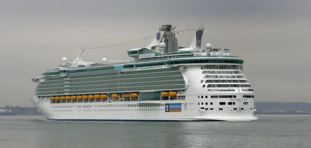 The world's largest cruise ship the Freedom of the Seas arrives of Calshot Castle in Southampton Water. Photo: Getty Images