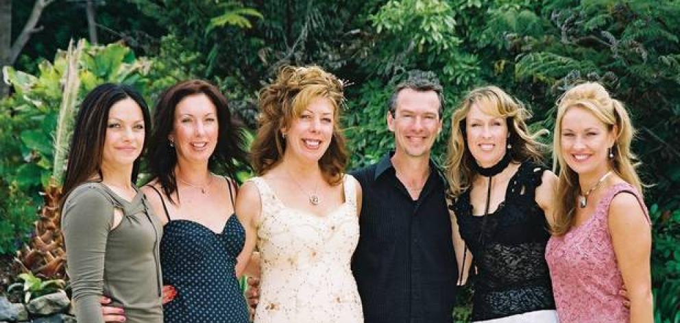 The Lawson quins with older sister Leeann (in white) at her wedding in 2003. From left: Deborah, Lisa, Leeann, Samuel, Shirlene and Selina. Photo / Supplied The Lawson quins with older sister Leeann (in white) at her wedding in 2003. From left: Deborah, Lisa, Leeann, Samuel, Shirlene and Selina. Photo / Supplied
