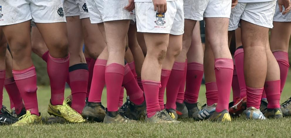 The Otago Boys' players in their pink socks.