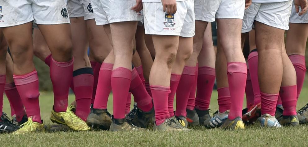 The Otago Boys' players in their pink socks. 