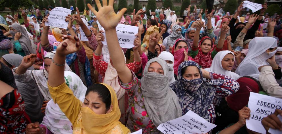 Kashmiri women shout slogans at a protest in Srinagar. Photo: Reuters