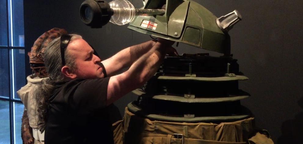 Warren Goodwin assembles his Dalek model for this year's iNDx exhibition. Photo: ODT