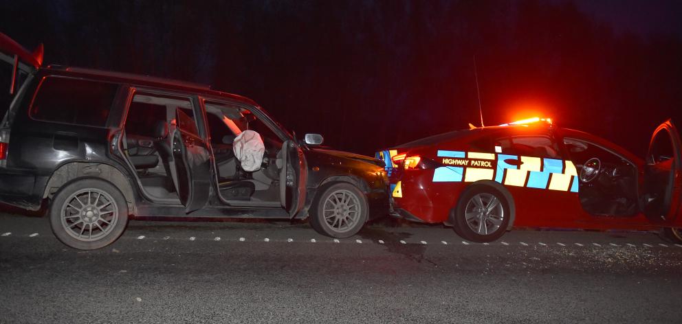 Police say the man crashed his car into a patrol vehicle, then approached an officer in a...