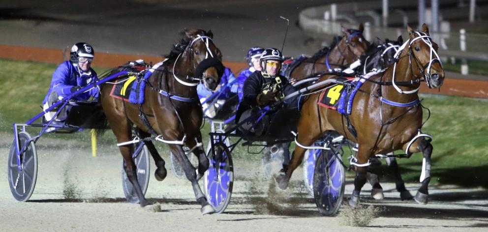 Chase Auckland and driver Tim Williams (inner) hold out Spankem and Mark Purdon to win the New...